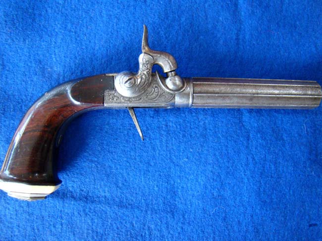 A very fine .44 cal. Belgian percussion pistol with silver inlaid ivory butt cap circa 1840